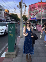 Astro Slip Maxi Dress - Long in Navy blue on a city street