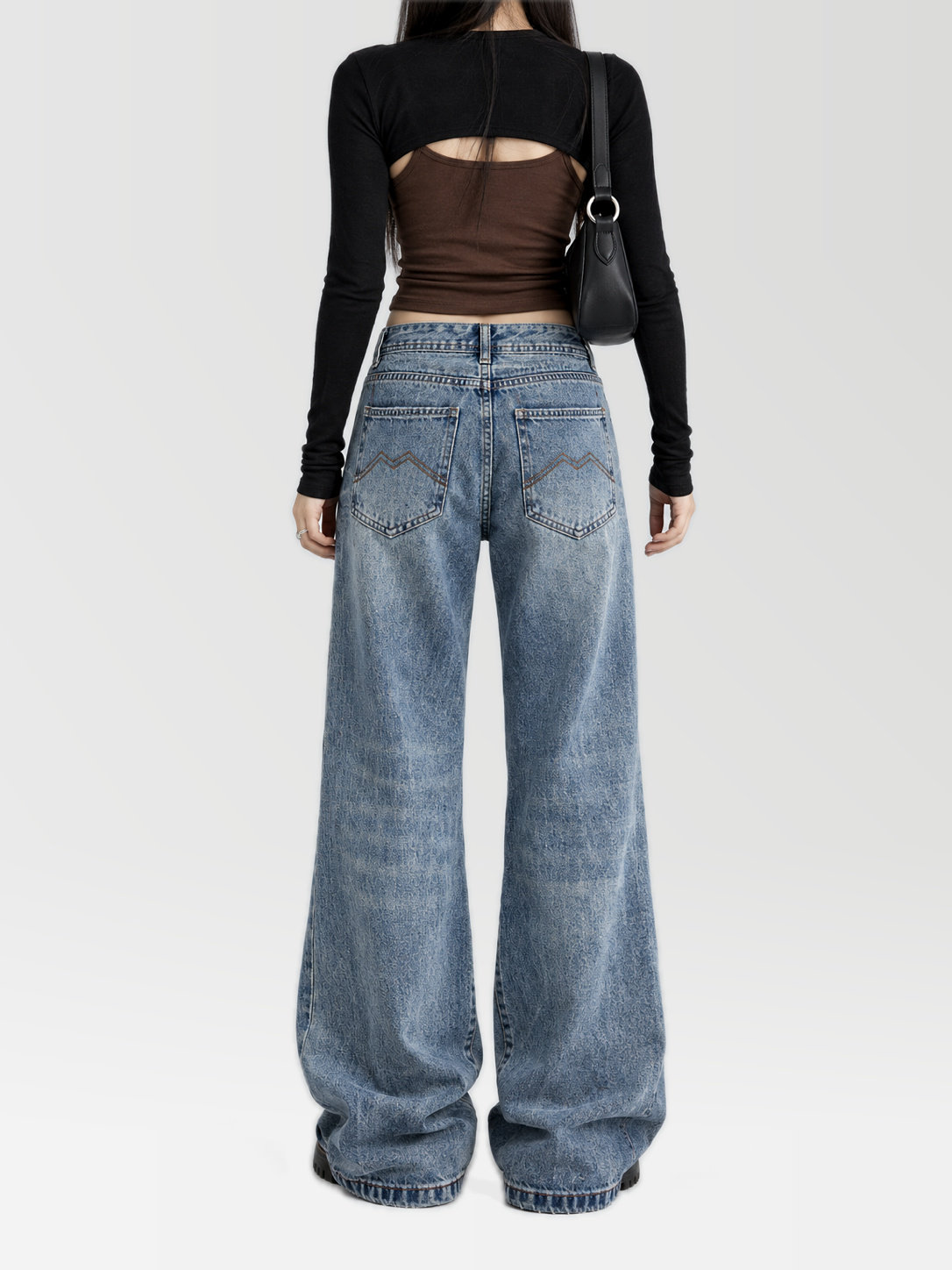 Low Rise Flare Jeans in Medium Blue — AREUMIEUR, full-length studio look, back view