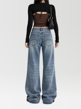 Low Rise Flare Jeans in Medium Blue — AREUMIEUR, full-length studio look, back view
