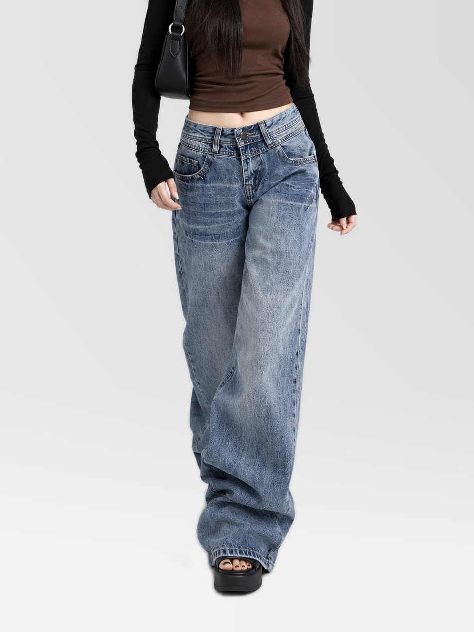 Low Rise Flare Jeans in Medium Blue — AREUMIEUR, full-length studio look, walking view